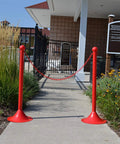 Heavy Duty Red Plastic Barrier Chain For Crowd Control And Straight To Point Line Setup At Outdoor Venues 500 Foot Long Roll With Hella Durable One Inch Links at pool entrance.