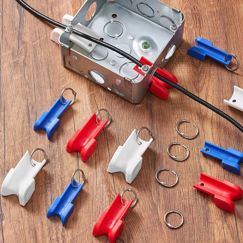 12 Piece Conduit Wire Pulling Grips Set With Open Ring Holders For 1 2 Inch 3 4 Inch And 1 Inch Electrical Cables on wooden surface.