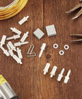 All In One Plantation Shutter Repair Kit With 85 Pieces Sturdy Shutter Louvers Staples Repair Pins on wood surface
