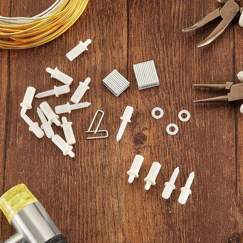 All In One Plantation Shutter Repair Kit With 85 Pieces Sturdy Shutter Louvers Staples Repair Pins on wood surface