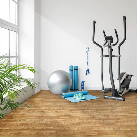 Wood Grain Foam Floor Tiles With Interlocking EVA Puzzle Mats And Borders, Three Eighths Inch Thick, 48 Sq Ft Coverage For Home Playroom Basement Or Studio, Easy Setup And Soft Cushion For Kids And Baby Safe Floors in a home gym setting with equipment.