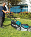 Pro Grade 21 Inch Cordless Self Propelled Lawn Mower being used on grass by a person, showcasing its brushless motor and aluminum deck.