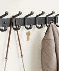 Wall Mounted Heavy Duty Metal Coat Rack With Six Hooks For Coats Hats Bags Robes Keys And Towels Entryway Mudroom Or Closet Organizer In Rust Resistant Black Finish holding keys, bag, and coat