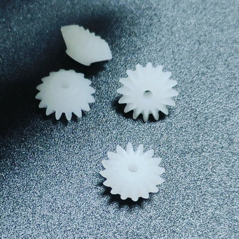 Close-up of Dope Ten Piece Bevel Gear Set 0.5 Module 16 Teeth 1.9mm Bore 2mm Tight Fit Plastic S162A Bevel Gears.