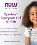 Smiling child beside Bubblegum Splash XyliWhite Kids Toothpaste Gel Fluoride Free SLS Free Sugar Free Gluten Free image.