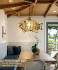 Woven Pendant Light Dope Boho Chandelier With Fish Shape Rustic Farmhouse Hemp Rope Rattan Fixture illuminating a dining room.