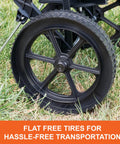 Close-up of flat free tire on 50 Lb Push Lawn And Garden Broadcast Spreader For Seed And Fertilizer, Walk Behind, Rust Proof Poly Hopper