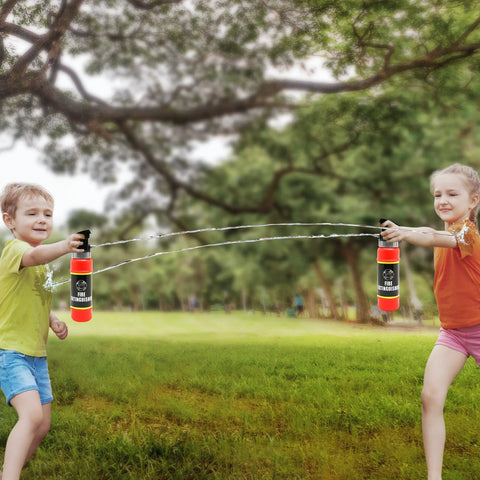 Realistic Nine Inch Fire Extinguisher Squirter Toy Pack Of Two Pump Action Water Blaster For Kids in action during summer play.