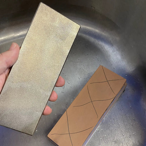 Alt Tag: Hand holding Diamond Lapping Plate 220 Grit for Flattening Waterstones and Sharpening Blades, ultra-flat under 0.0005 inches.
