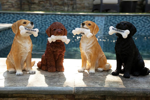 Four dog garden statues with welcome signs, including Solar Black Labrador Dog Garden Statue With LED Bone Welcome Sign