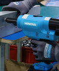 Heavy Duty Brushless Cordless Rivet Gun With 18V 4Ah Battery fastening aluminum sheet with black rivet.