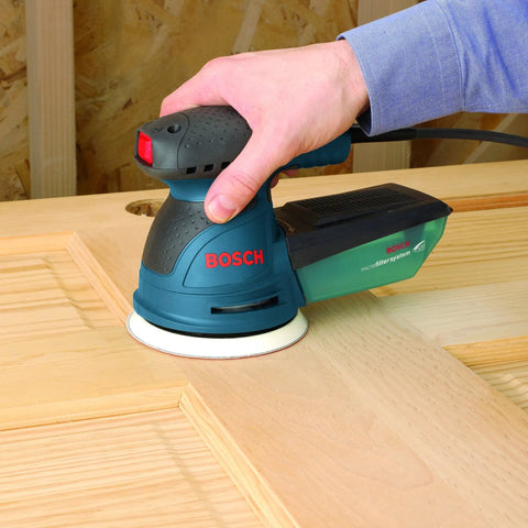 5 Inch Palm Random Orbit Sander Polisher With Two Point Five Amp 120 Volt Motor 12000 OPM Pad Dampening Brake in use on wood