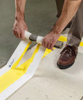 High Adhesion Floor Marking Stencil With Continuous Line For Rough Textured Surfaces, 0.25 In Height, 4 In Width, 1200 In Length, Polyester Clear White, Easy Measuring With Printer Markings For Precise, Clean Paint Lines In Busy Warehouses applied on floor
