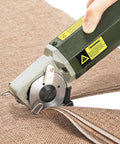 Dive into heavy duty sewing projects with this electric rotary fabric cutter cutting burlap fabric layers effortlessly.