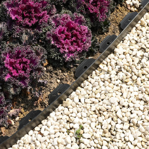 Two Pack 1.5 Inch Garden Edging Border 100 Ft Total Length Plastic Landscaping Edge With 120 Spikes separating mulch and gravel