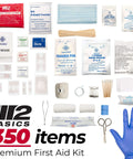 M2 BASICS 350-piece first aid kit contents with blue nitrile gloves, bandages, gauze, antiseptic wipes, and scissors