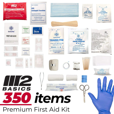 M2 BASICS 350-piece first aid kit contents with blue nitrile gloves, bandages, gauze, antiseptic wipes, and scissors