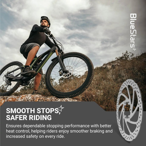 Mountain biker with 160mm 6-Bolt Stainless Steel Disc Brake Rotor for road, MTB, BMX bikes, lightweight, durable, all-weather performance.
