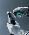 Person using Beast Of A Bottle Opener Durable Stainless Steel Bottle Opener For Home Bar And Outdoor Use With Easy Grip Handle