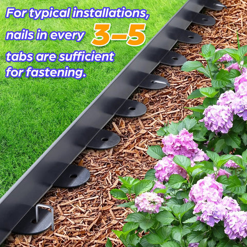 Flexible Plastic Landscape Edging Kit With 120 Metal Spikes, 1.5 Inch High defining garden border next to pink flowers and mulch
