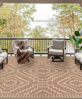 Outdoor Waterproof Plastic Straw Rug 8x10, Reversible Lightweight Carpet for RV Camping, displayed on a patio with beige and brown design.