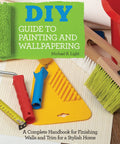 Your Totally Legit DIY Guide To Painting And Wallpapering Step By Step Manual with painting tools and roller on a table.