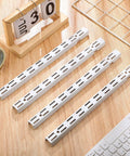 Four Piece Set Of Twelve Inch Dual Track Upright Wall Shelves With Notched Bracket Rail And Heavy Duty Adjustable Brackets for storage.