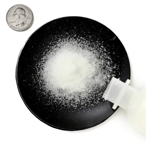 Two Bottles Of PCB Etchant, 8 Ounces Total, dry crystals on black dish next to quarter, ideal for copper etching