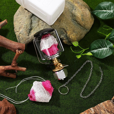 Portable Propane Gas Lantern For Camping With Copper And Stainless Steel Construction on grass with chain accessory