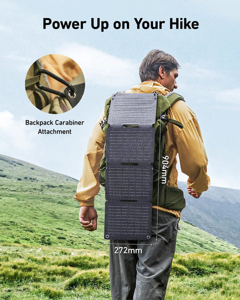 Solix PS30 Foldable 30W Solar Panel Charger attached to backpack with carabiner, showing IP65 weatherproof build for hiking.