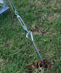 Heavy Duty Ground And Foundation Anchor Kit For Canopia Nature Greenhouses And Skylight Sheds Keeps Your Structure Steady In High Winds With Easy Top Mount Installation Compatible With Canopia Nature Series in use on grass.