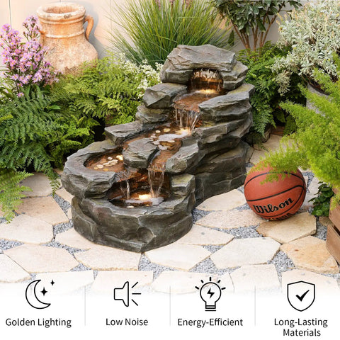 Epic 37 Inch Outdoor Floor Standing Five Tier Rock Waterfall Fountain With LED Lights for Patio, surrounded by plants and stones