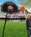 Child playing with Trampoline Basketball Hoop With Net in backyard, featuring easy install on 25mm straight or curved poles.