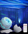 4 In 1 Aurora Galaxy Projector With Bluetooth Speaker White Noise Night Light And Moving Stars For Bedroom Decor Kids And Adults Beaming Northern Lights Ambience For Sleep And Christmas Vibes Beige Finish projecting stars and aurora lights on walls in a bedroom.