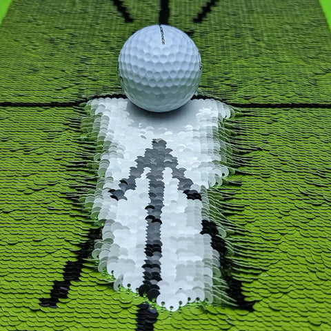 Sequin Tech Golf Mat With Instant Swing Feedback And Ball Impact Analysis showing swing path with golf ball on top