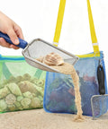 Two Pack Mesh Beach Shovel Set With Two Shell Bags For Kids Sand Sifters And Shell Collecting Kit in use on a sandy beach