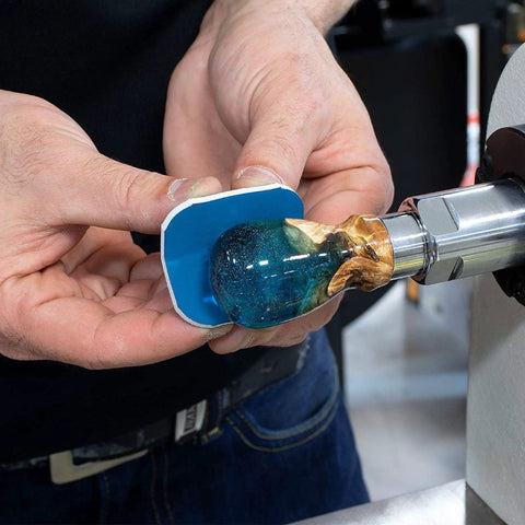 Person using Soft Touch Micro Mesh 2 Inch Sanding Pads Kit with Grits 1500 Through 12000 for polishing pen blanks on lathe