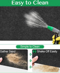 Outdoor Shed Floor Mat 7 X 4 Ft Waterproof Oil Absorbing Carport Pad With Non Slip Backing being cleaned with water spray