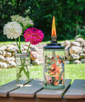 Wildflower Glass Outdoor Torches 2-Pack, 65-Inch Easy Install Patio Backyard Lighting For Stylish Lawn Ambience, glass torch on table