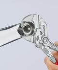 Adjustable Pliers Wrench Set 7 Inch and 10 Inch With Keeper Pouch Parallel Jaw Design in use gripping a metal pipe fitting