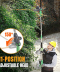 Man using 20V Cordless Pole Hedge Trimmer With 9.2 Foot Reach, 11-Position Rotating Head on tall hedge