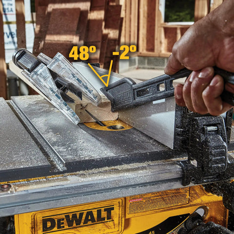 Compact Jobsite Table Saw cutting wood at a 48-degree angle with rack and pinion fence for precise cuts.