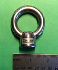 Tough As Nails Marine Grade Stainless Steel 316 M12 Lifting Eye Nut on green background with ruler for size reference.