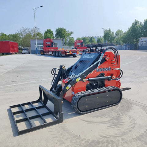 Small But Mighty Mini Skid Steer Loader With Leveler, 1800lbs Capacity in a parking lot, ready for gardens, farms, and parks use