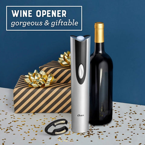 Cordless Electric Wine Opener With Automatic Cork Extractor And Precision Foil Cutter With Rechargeable Base next to a wine bottle and gift-wrapped presents.