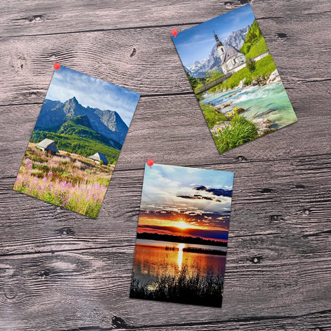 Top Shelf Office Upgrade Supercharge Your Daily Workflow With This Assorted 300 Piece Map Tack Set Featuring Smooth Plastic Bead Tops And Stainless Steel Wires designed to secure colorful landscape photos on a wooden bulletin board.