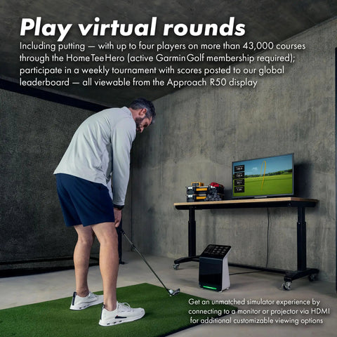 Golfer using R50 Pro Grade Golf Launch Monitor And Simulator Bundle during indoor practice with screen and club.