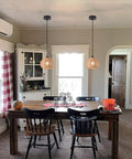 Dining room with Boho Woven Pendant Light Dome Chandelier, Rustic Farmhouse Hemp Rope Rattan Ceiling Fixture above table.