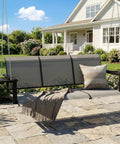 Gray Textilene 3 Seat Porch Swing with cup holder on patio, featuring hanging chains and a cushion, 700 lb capacity.