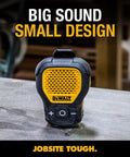 Wearable Clip On Bluetooth Speaker For Job Sites, Water Resistant Portable Speaker With Built In Mic For Hands Free Music And Calls, Rugged Yellow Clip On Design With Pro Audio Sound on a workshop table.